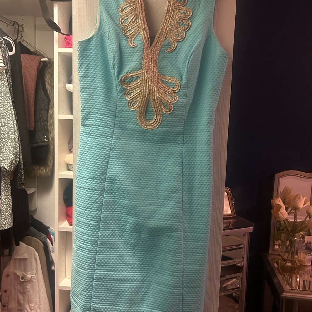 Elegant Blue Dress with Gold Accents
